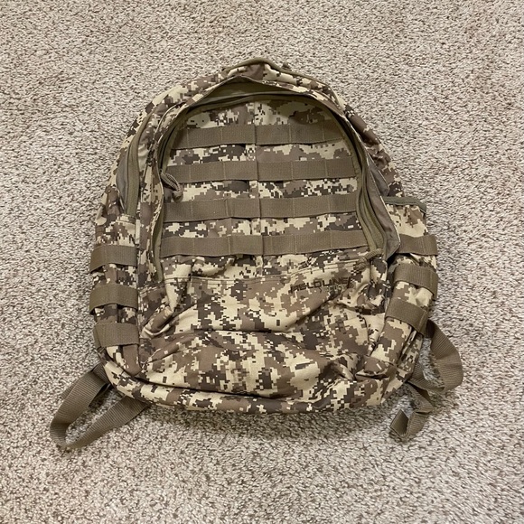 Other - Military camouflage backpack size‎ medium in excellent condition